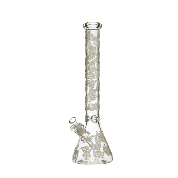 Clear glass beaker with silver leaf pattern on a white background