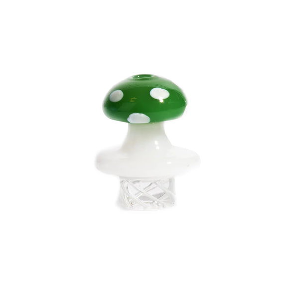 Glass mushroom-shaped pipe with green cap on a white background