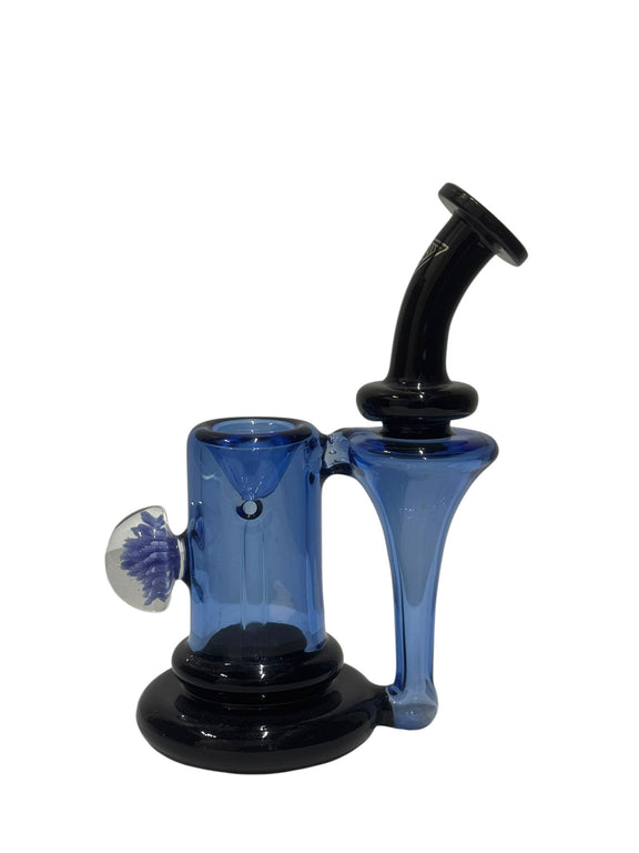 Blue glass bong with black accents on a white background