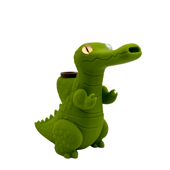 Green alligator-shaped container on a white background