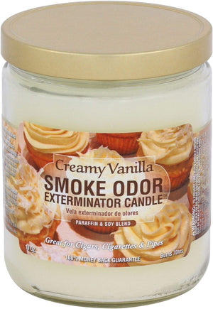 Jar of creamy vanilla smoke odor exterminator candle with a gold lid.