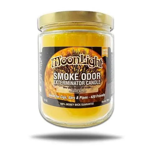 Jar of Moonlight Smoke Odor Exterminator Candle with gold lid on a white background