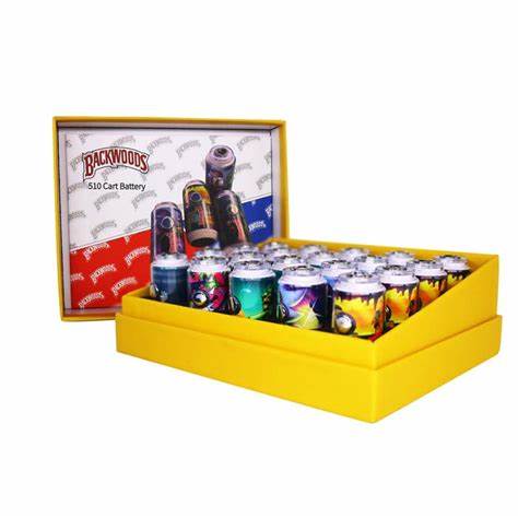 Yellow box containing colorful vape devices with a visible 'Backwoods' brand on a white background.