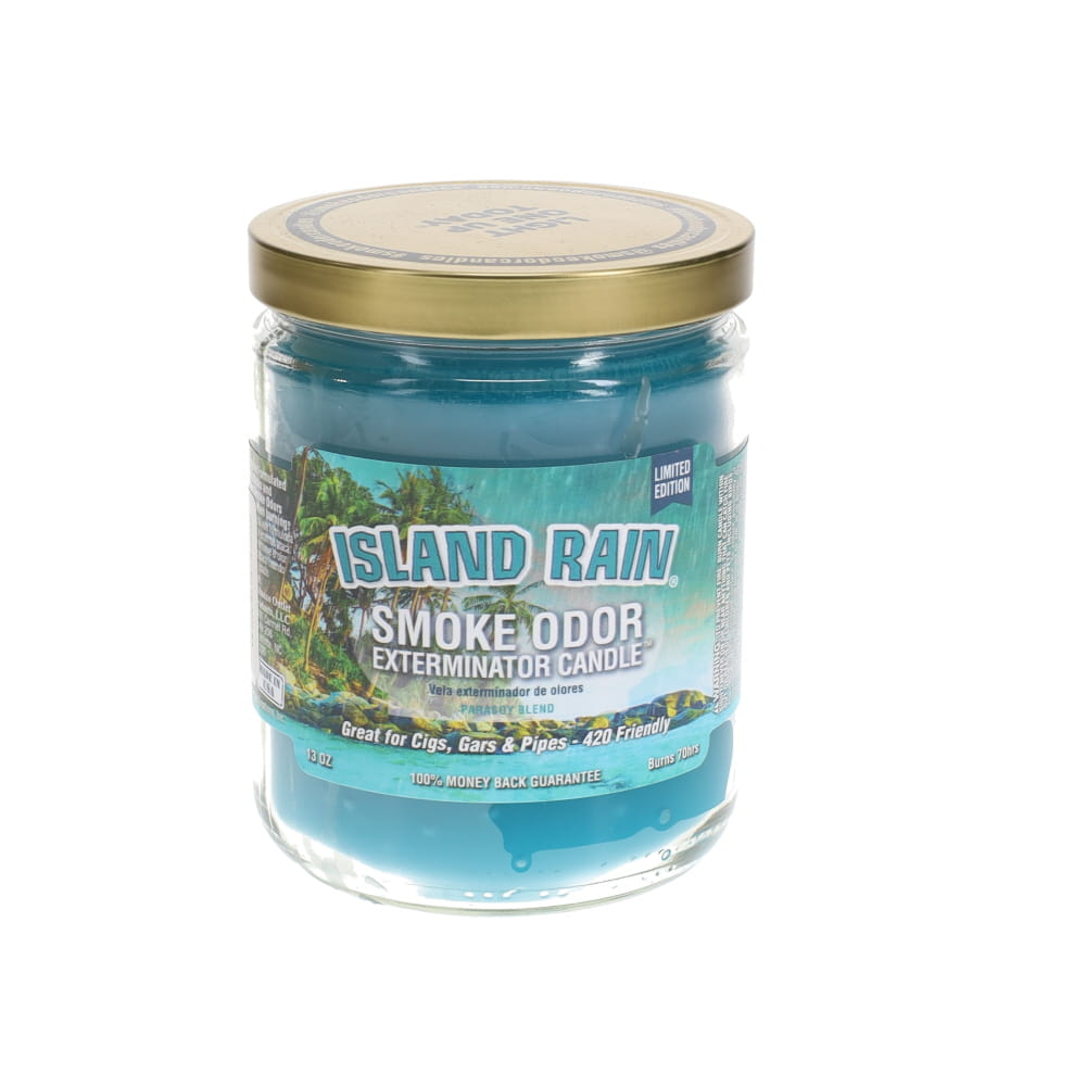 Candle jar labeled 'Island Rain' with a gold lid on a white background