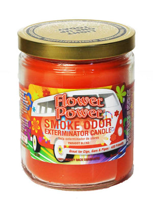 Jar of 'Flower Power Smoke Odor Exterminator Candle' with colorful label on a white background