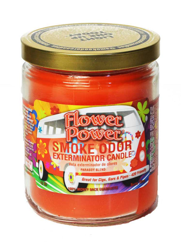 Jar of 'Flower Power Smoke Odor Exterminator Candle' with colorful label on a white background