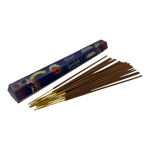 Incense sticks with their packaging on a white background